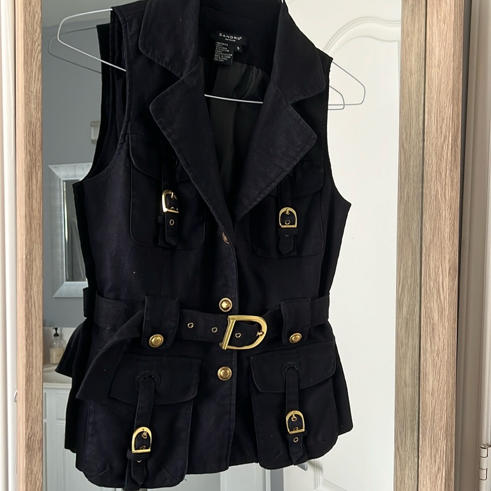 Denim black jacket. Will go nice with blue or white jeans.